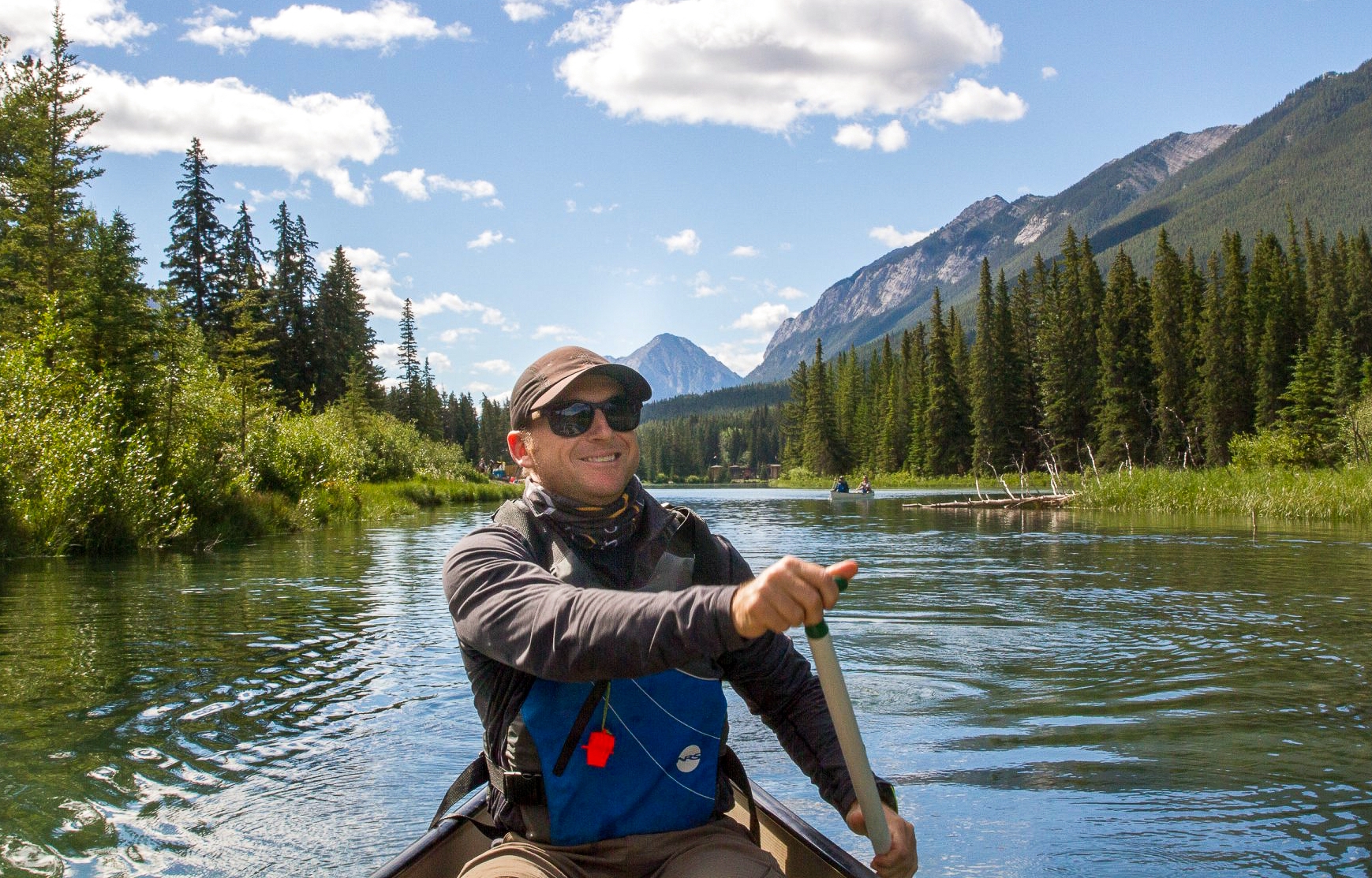 Canoeing The Bow River Near Banff National Park