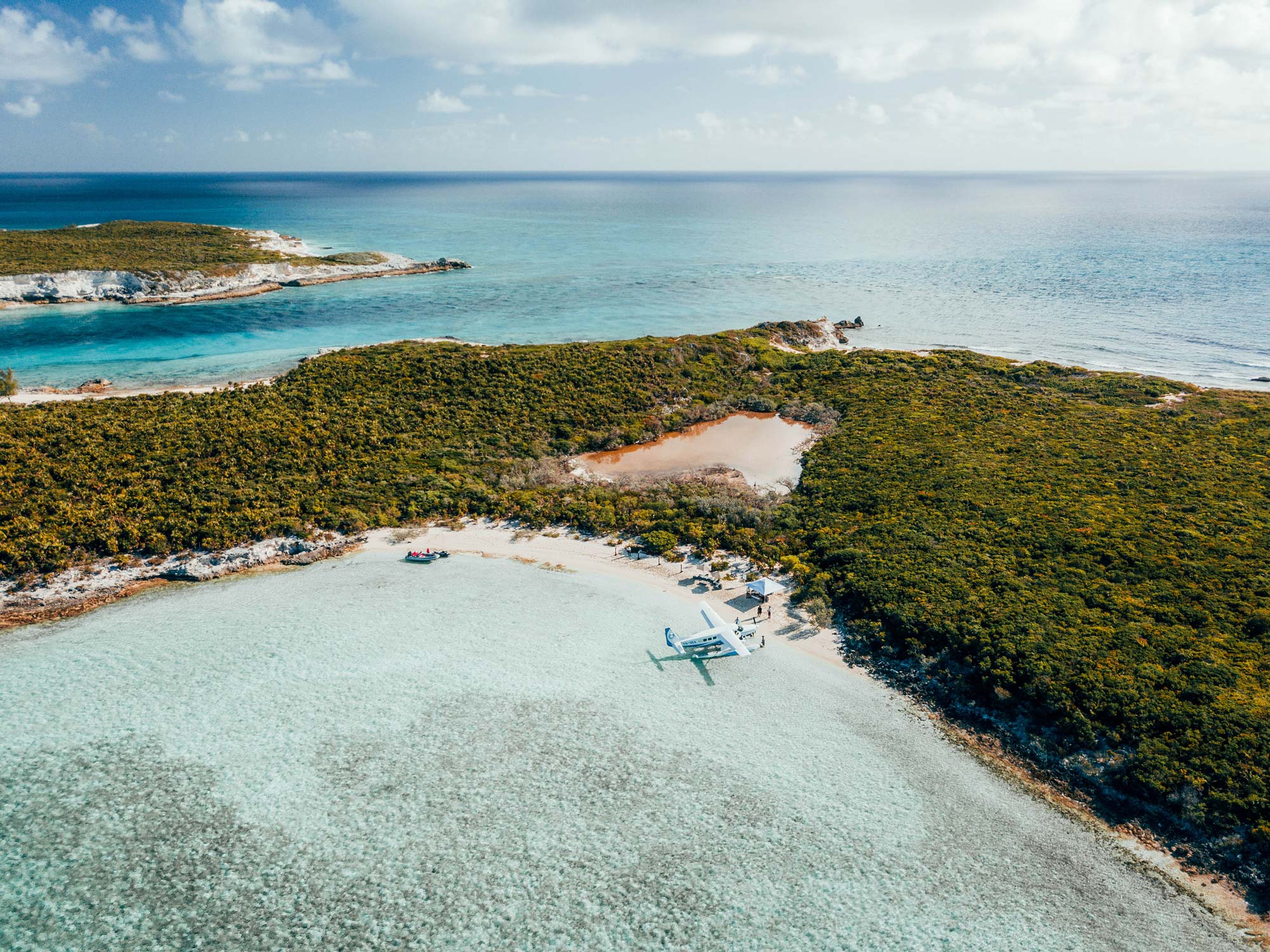 A plane lands near a private island in the Bahamas.