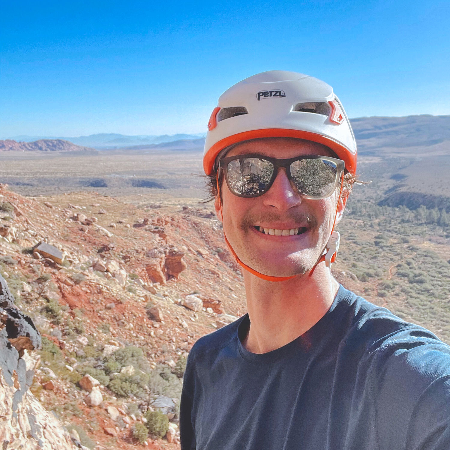 Headshot of Josh Krysiak in the desert.